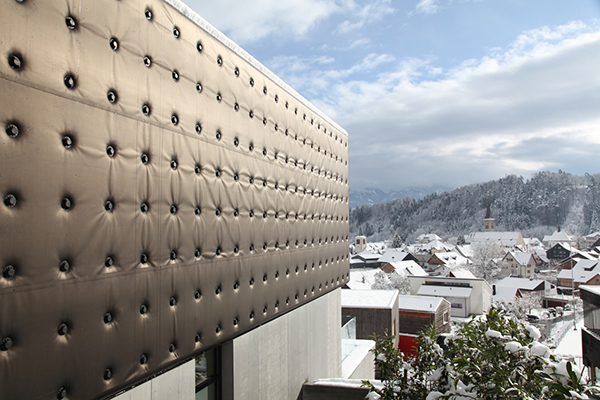 Image of  rubber sheeting and architectural carpeting as sustainable facade materials.