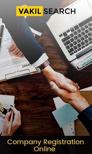 Company professionals giving a handshake after an online company registration process.