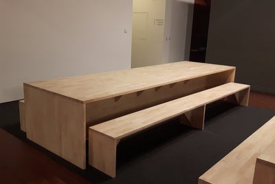 A Set Of Rubber Wood Table And Benches In A Canteen Room.